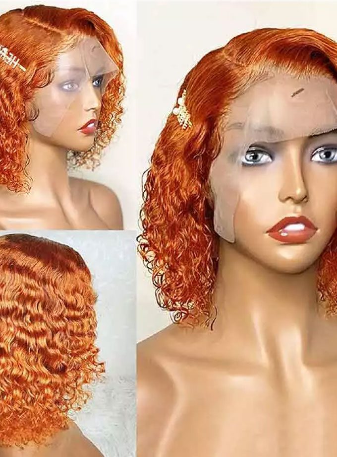 A woman with orange hair is wearing a wig
