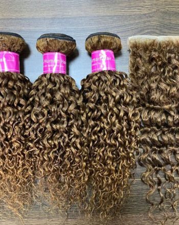 A group of three bundles of hair on top of a table.
